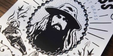 George Harrison of The Beatles wearing a hat